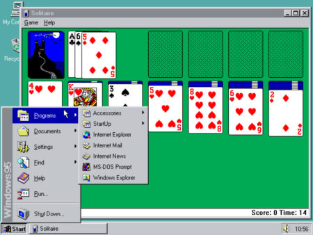 A screenshot of Windows 95 with Solitaire on the screen.